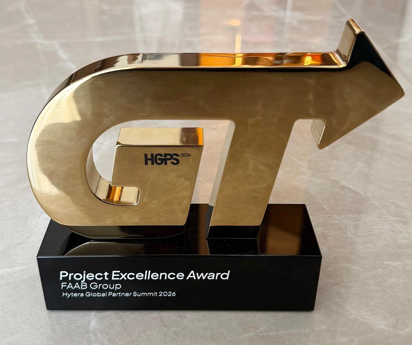 Project Excellence Award trophy presented to FAAB Group at the Hytera Global Partner Summit 2026